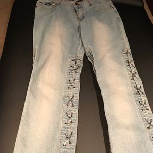 Blue denim jeans laced with silver chain